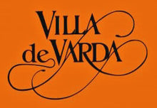 Laden Sie das Bild in den Galerie-Viewer, Weinkeller Hohenbrunn präsentiert das Logo der Villa de Varda, einer Destillerie im Trentino.
